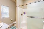 Master bathroom with a step in shower